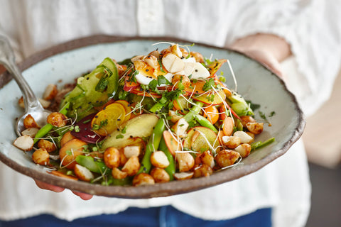 Layered salad with ginger and soy macadamias