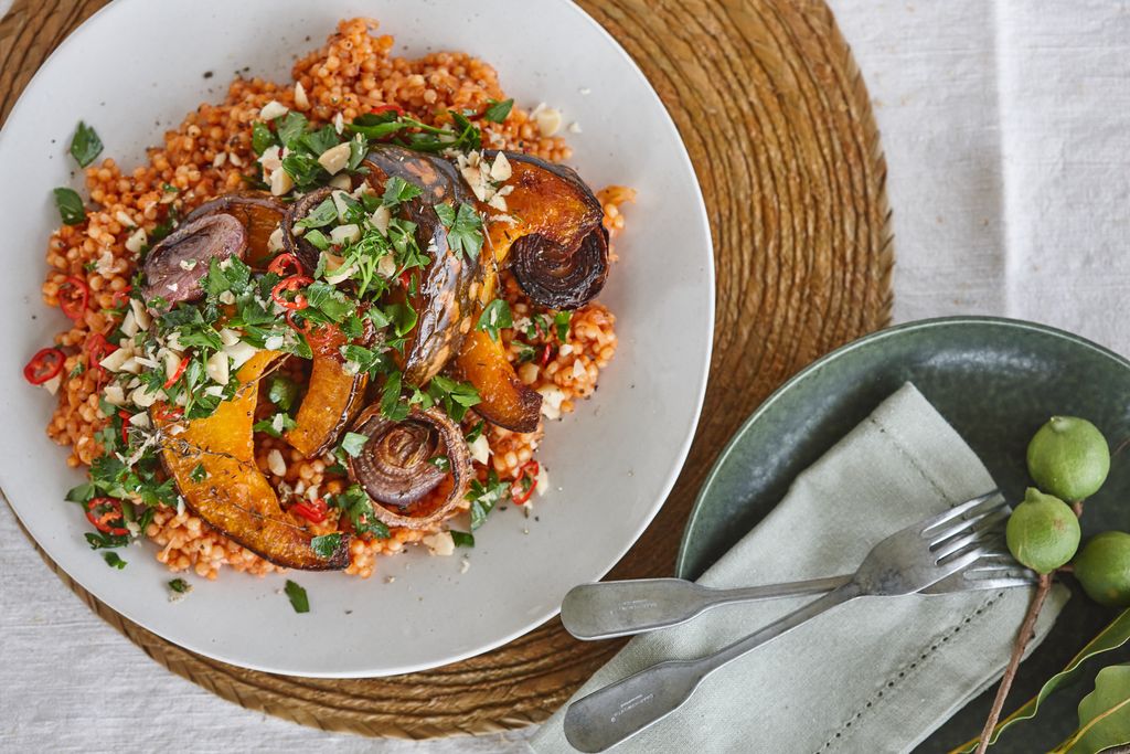 Pearl couscous with caramelised pumpkin, onions and macadamia chimichurri