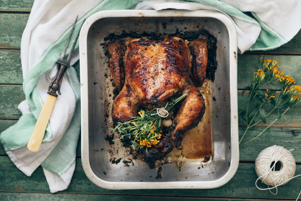 Roast chicken with macadamia couscous stuffing